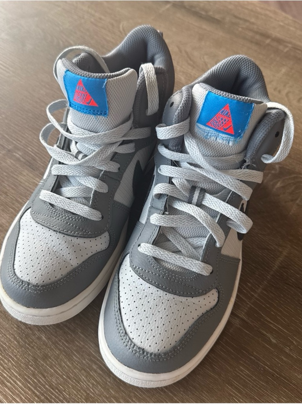Nike Kids Grey and White High-Top Sneakers with Blue Accent